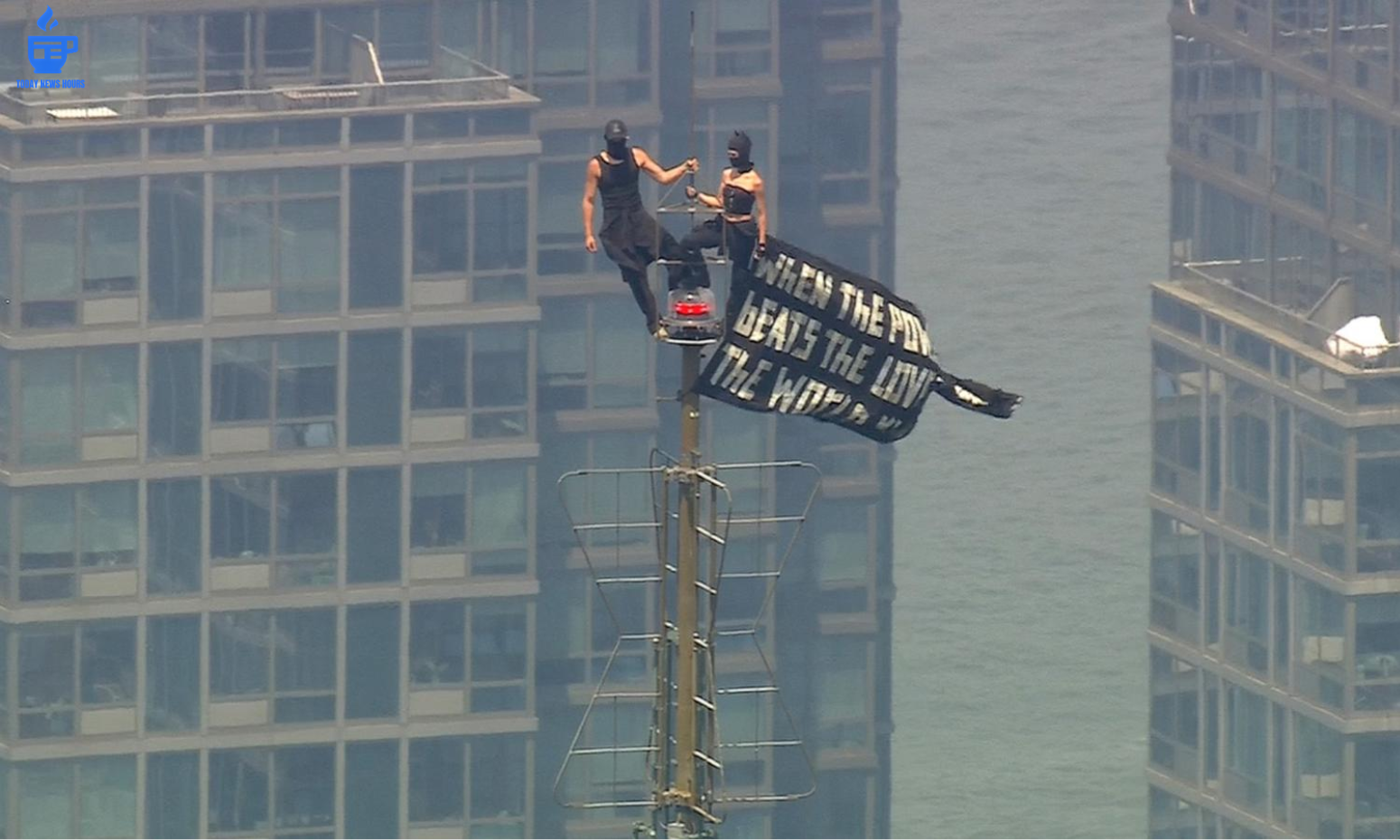 Empire State Building Climb Turns Into Dramatic Proposal as Two Daredevils Unfurl Peace Banner